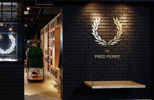 The Fred Perry Laurel Wreath Store in Singapore, designed by Studio Königshausen, pays homage to music and youth culture through its unique design. 